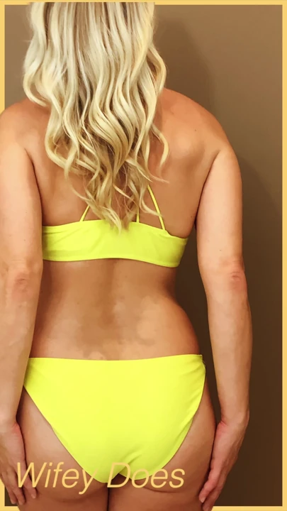 Wifey wears a skimpy yellow bikini