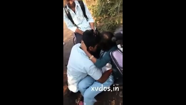 Collage Girl Having Kissing Session With Friend Infront Of Other Friends