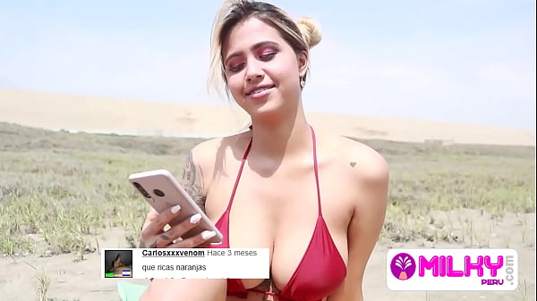 Huge tits on the beach, she is horny and wants my cock.