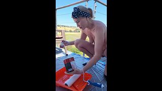 Naked housewife paints walls in public