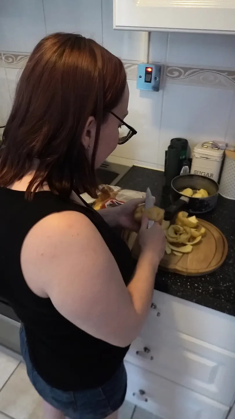 Wife cooking dinner