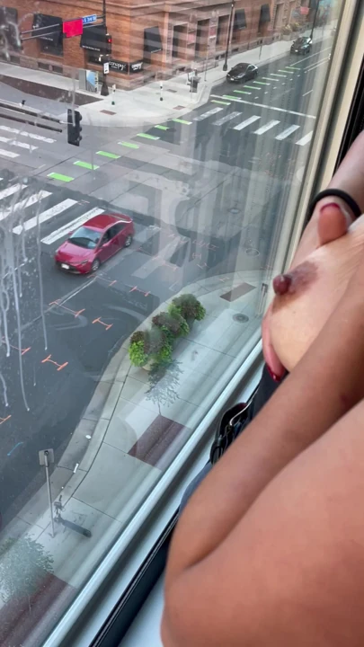 Downtown city window BREASTMILK squirt